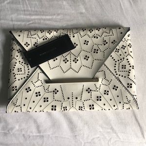BCBG secret envelope clutch